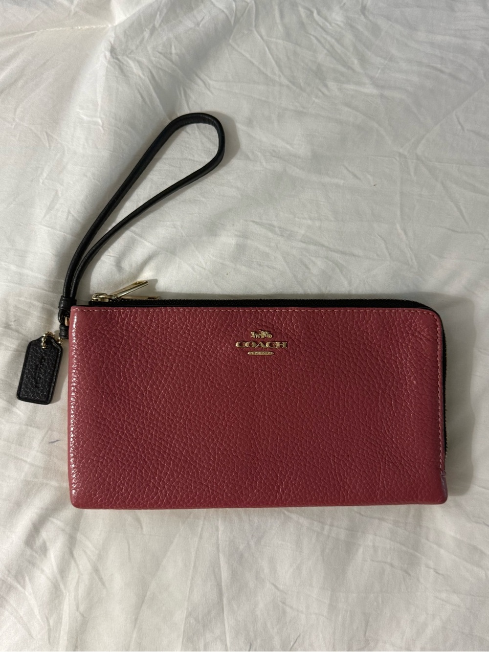 COACH Pink Pebbled Leather Zip Wristlet with Black Strap